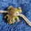 Thumbnail: Top front view of the Green Carved Bakerlite Frog On A Braided Bracelet 1920s Art Deco