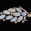 Thumbnail: Front view of the White Metal Leaf Shaped Brooch with Pale Blue Stones and Bar Fastener