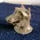 Thumbnail: Left side view of the Studio Art Light Brown Figure Head Of A Mythical Animal