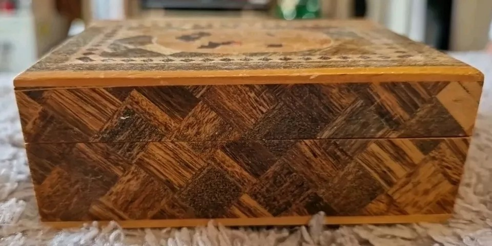Front view of the wooden box showing the detail
