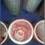 Thumbnail: Close up top view of one of the Shrimp Pink and white Ceramic Small Vases