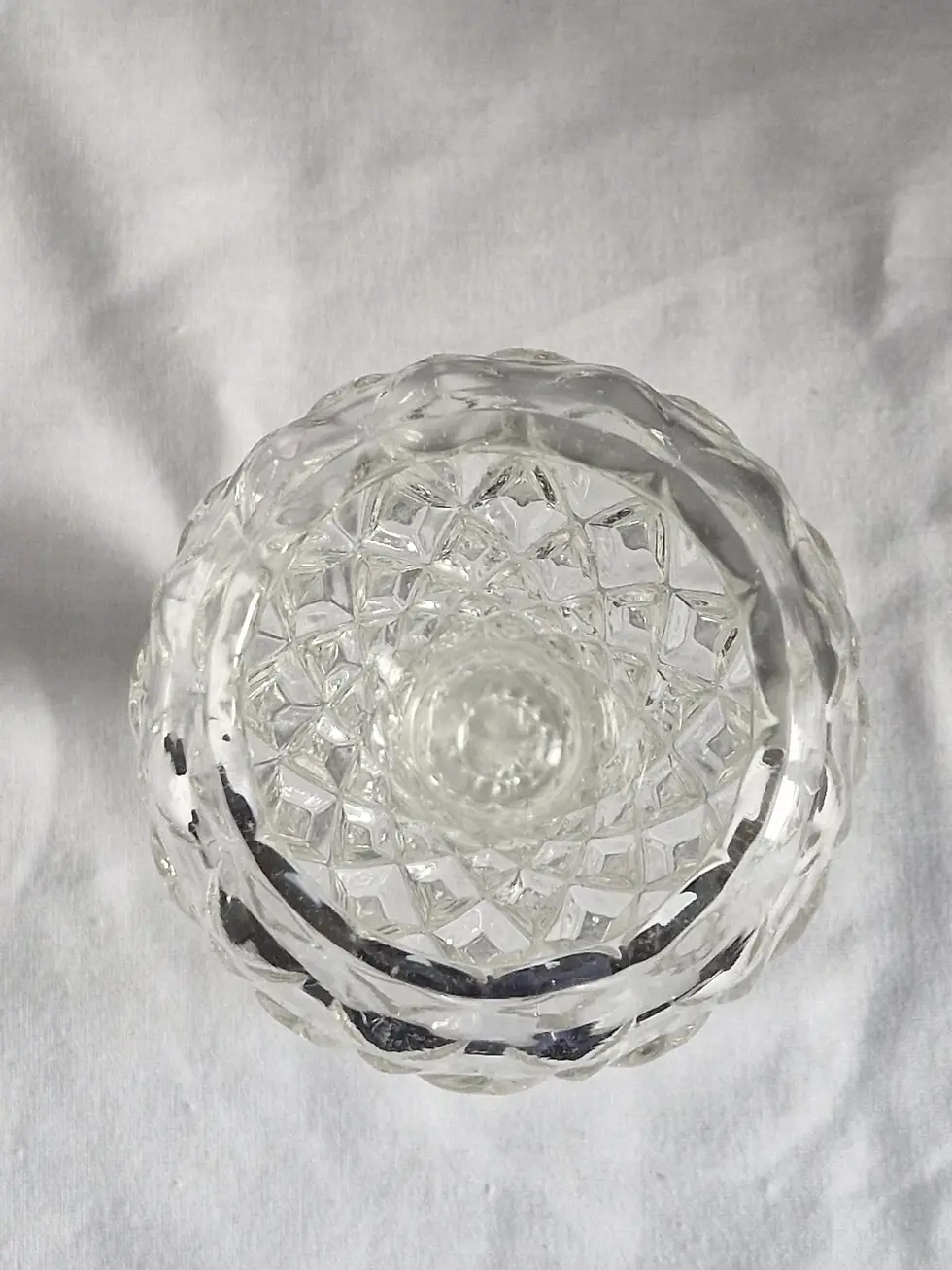 Top view of the Vintage Small Clear Glass Footed Vase In Diamond Pattern