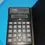 Thumbnail: Top open case view of the Canon LS 35 Calculator with numbers showing in the display