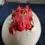 Thumbnail: Close up front view of the Red Dragon Hatching From Egg Money Box