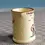 Thumbnail: Front view of the Llandudno Miniature Cream Jug with a lady and spinning wheel relief design