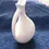 Thumbnail: Left right view of the Italian Olive Oil Pitcher with a red onion design