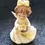 Thumbnail: Top view of the Vintage German Porcelain Figurine Birthday Yellow and White July Angel