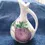 Thumbnail: Left side view of the Italian Olive Oil Pitcher with a red onion design