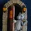 Thumbnail: Front view of the Cute Multicoloured Dragon Opening A Door Wall Hanging