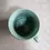 Thumbnail: Top view of the Vintage German 0.2L Green Ceramic Mug Weihnachtsmarkt Der Nationen 2005