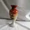 Thumbnail: Left side view of the Beautiful antique damaged Hand painted Autumn Flowers Opaline glass vase