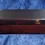 Thumbnail: Front view of the Vintage Wooden Box Containing 14 Numbered Napkin Rings