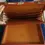 Thumbnail: Front open view showing the dividers inside the lid of the Vintage Presto Red/Brown Leather Brief Case with Stickers