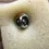 Thumbnail: Rear view on a cushion of the Beautiful Vintage 1980s style Silver tone flower pressed Metal lapel pin badge