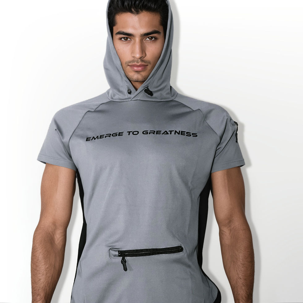 A model wearing a light grey short sleeve dri-fit shirt with a hood with "Emerge to Greatness" in black text across the front and a black zipper pocket located on the front