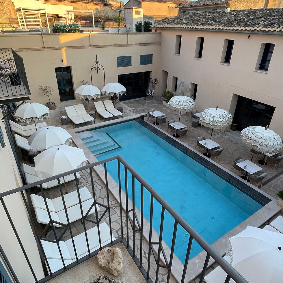 store with a wall full of different scents of perfumes and body lotion