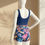 Miniatura: Traje de baño de una pieza, color azul con estampado tropical