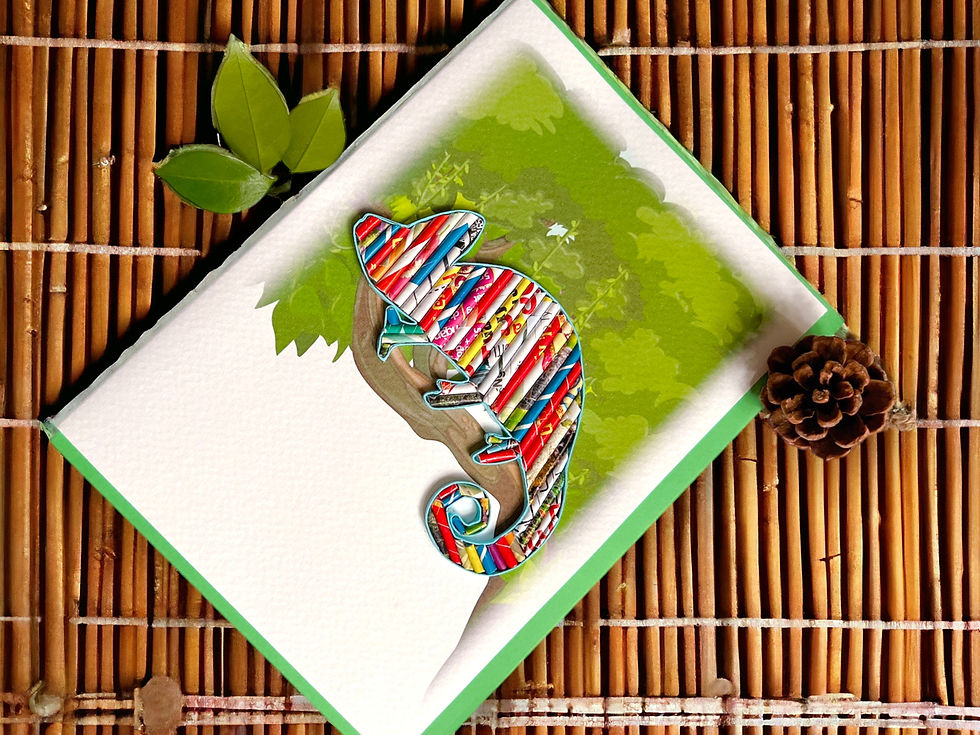 Thumbnail: iguana handmade from paper stick on a tree branch