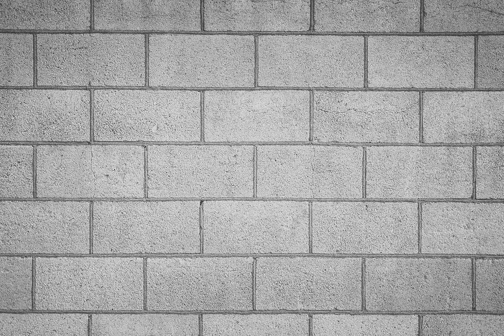Gray concrete block wall texture repeating pattern
