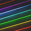 Neon rainbow wall stock photo