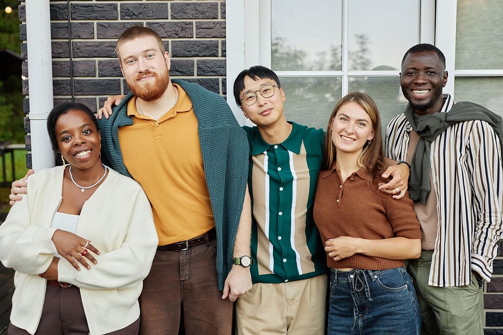 happy-friends-posing-smiling-at-camera-2025-03-07-18-30-57-utc.jpg