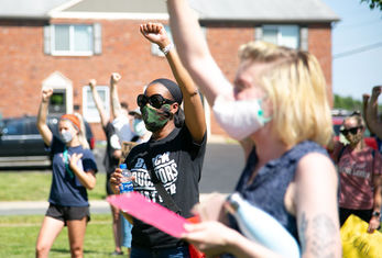 Shawnee Mission area educators march for social justice in demonstration by Oak Park Mall.