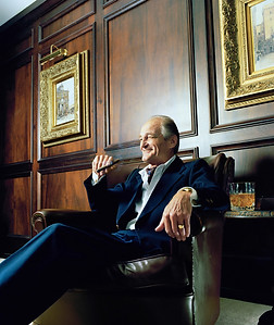 100349548-wealthy-older-man-relaxing-wit