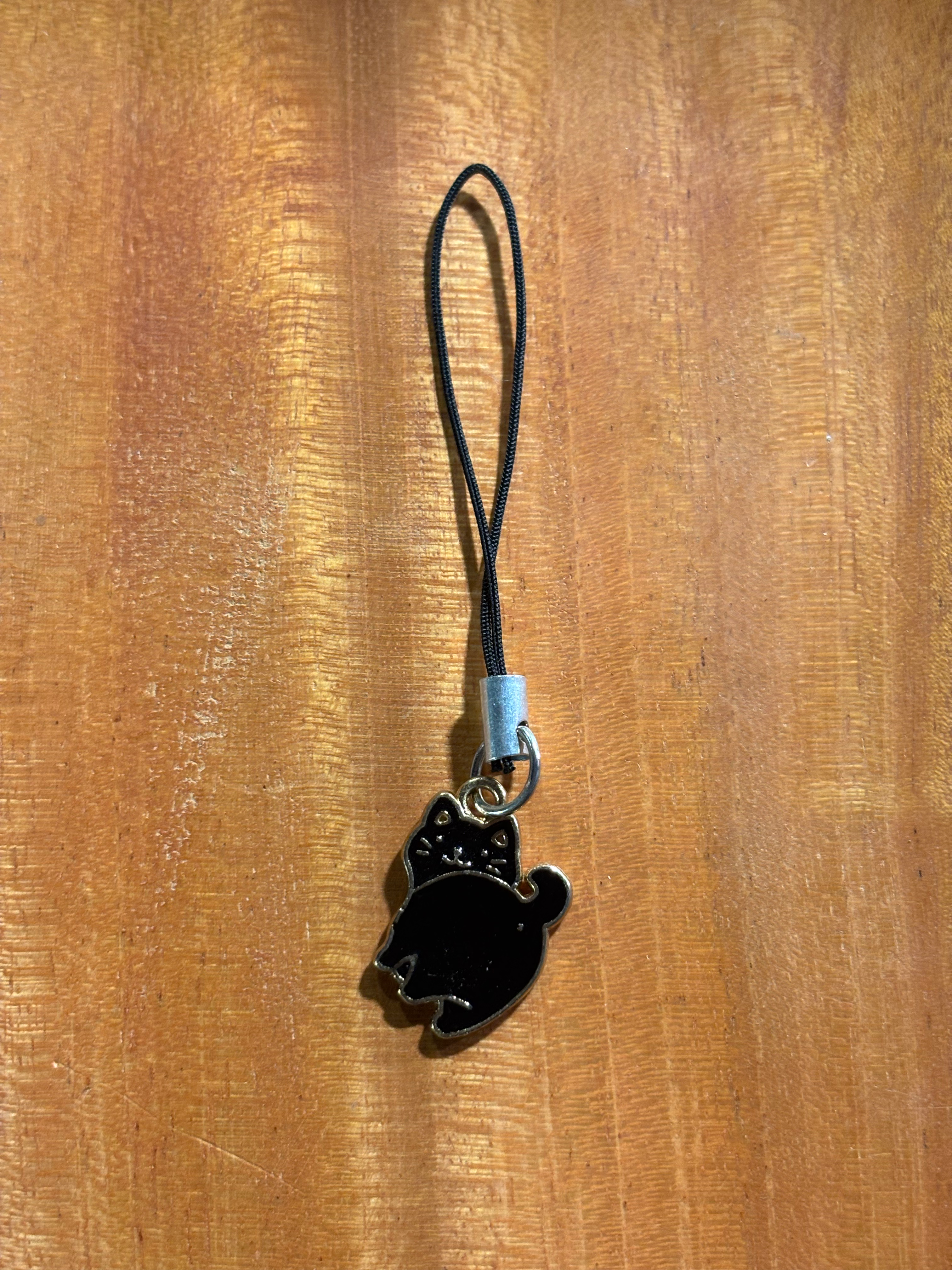 Cat back bow phone charm