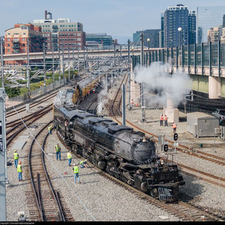 Tranes 289-Denver Union Station! Big Boy, 4014 is seen here backing into busy Union Statio