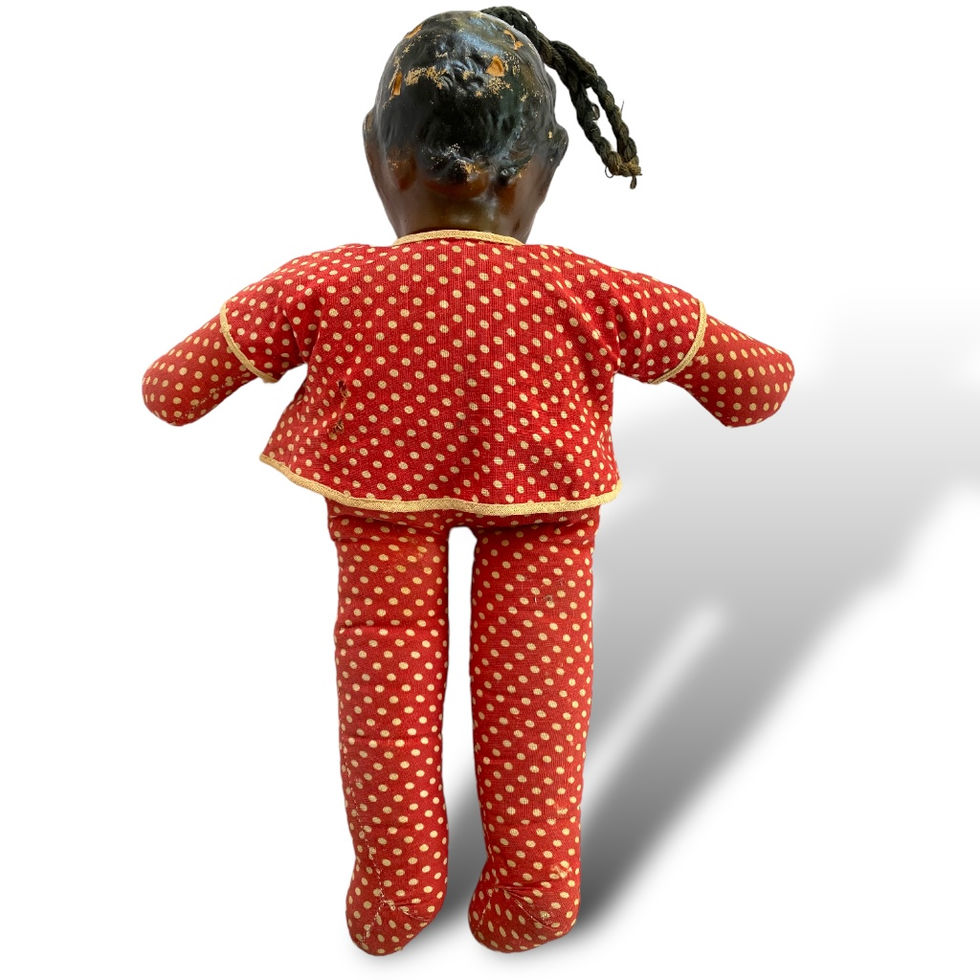 Back view of Ralph Freundlich Black Americana Soft Body Goo Goo Topsy Doll