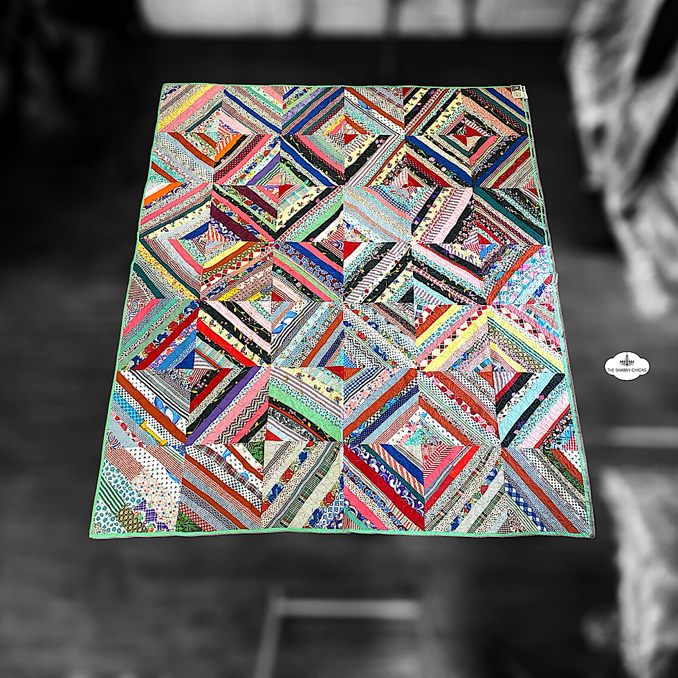 Vintage multi-colored strips quilt
