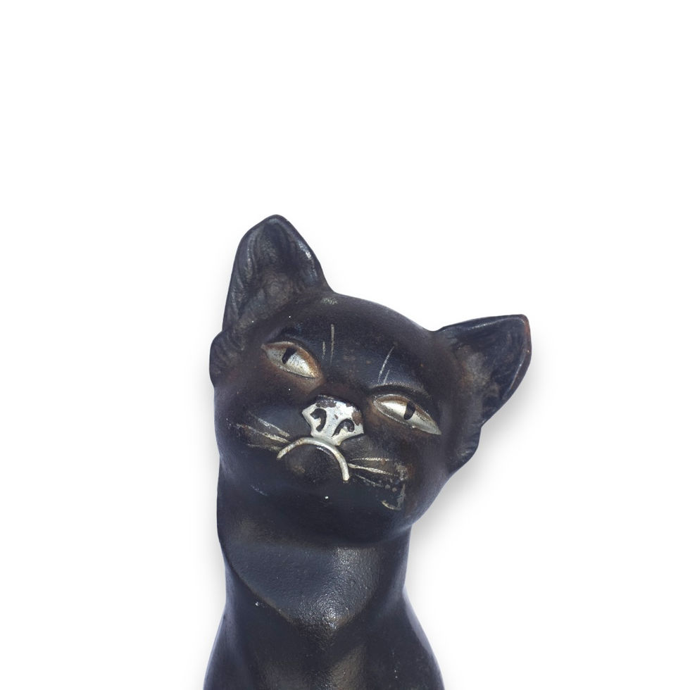 Hubley cast iron black cat door stopper face close-up view