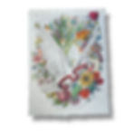 A white dove adorned with flowers and butterflies, featured in The Land Of Elsewhere  paper artwork "Peace Is Beautiful”