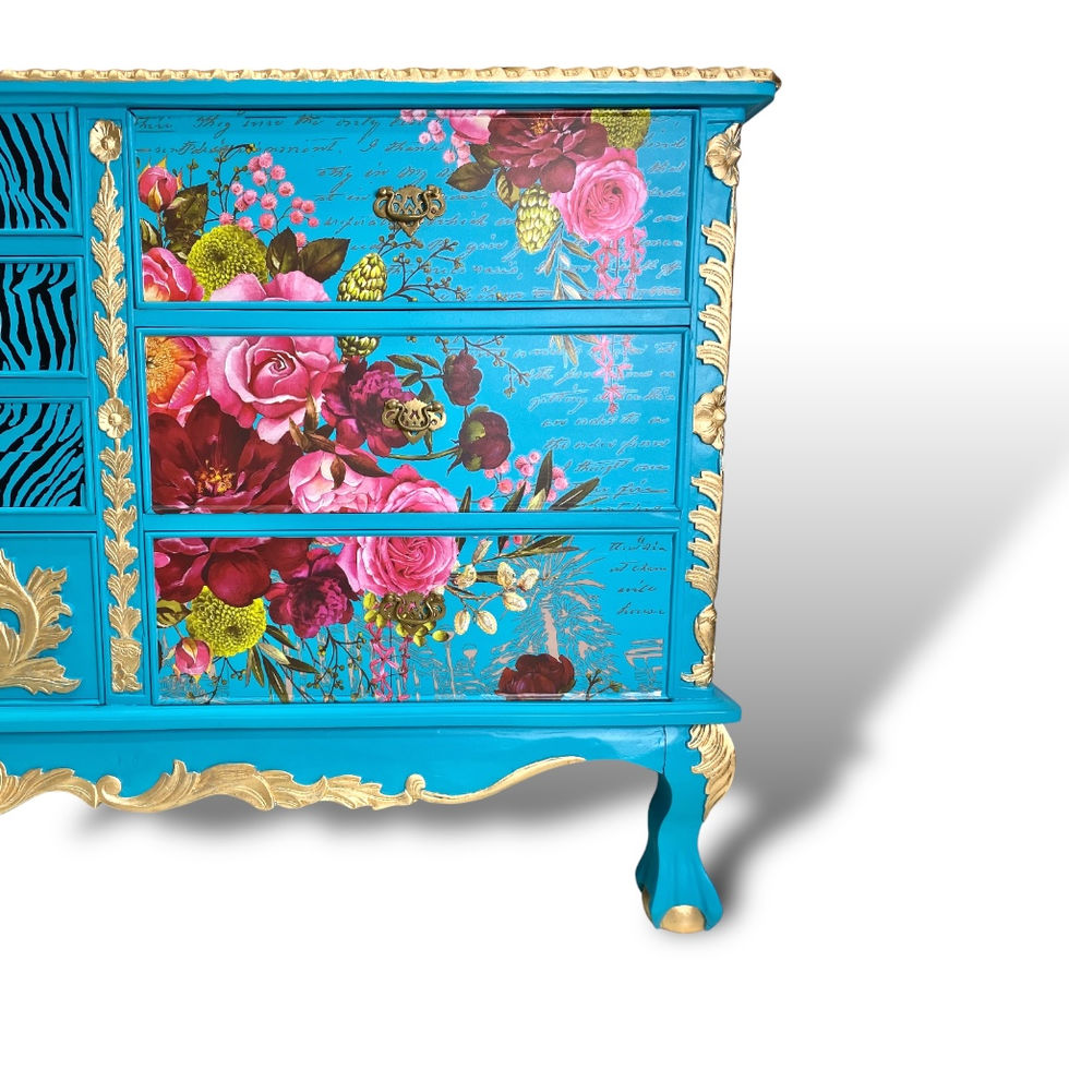 turquoise painted dresser with gold accents and pink floral patterns