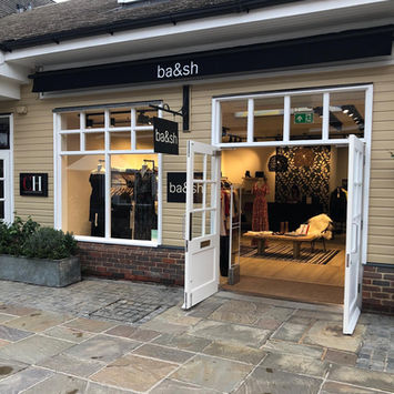 Business with wood-framed doors and windows