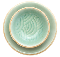 Green ceramic pottery bowl and plate