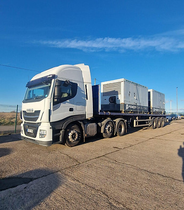 Side view of truck with large boxes on back
