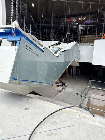 New escalator being lowered by crane into position at M&S, Liverpool