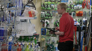 Man choosing tools in DIY store