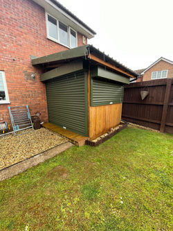 Roller shutters on a garden shed