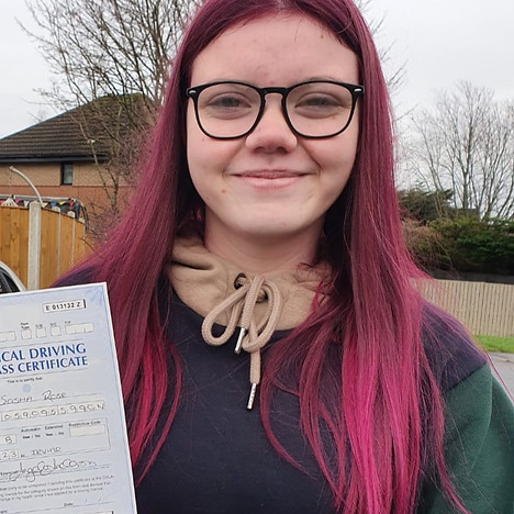 Girl smiling after passing driving test