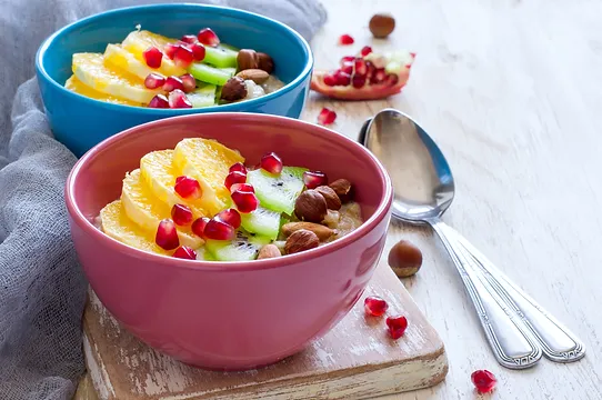 Oatmeal with fruit and nuts for a health.webp