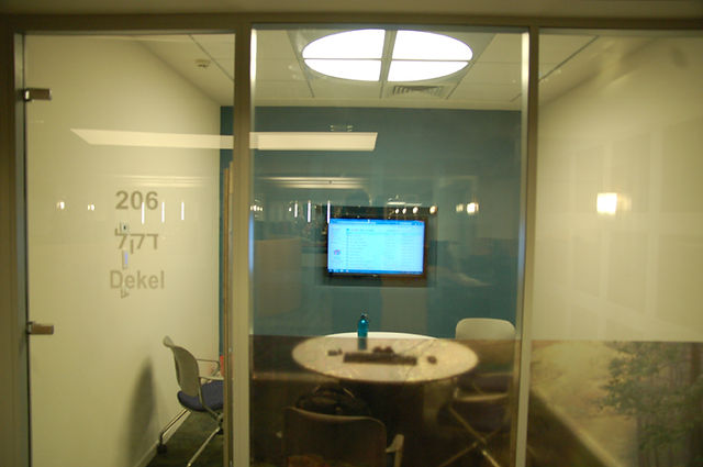 Unique light fixture above a computer corner