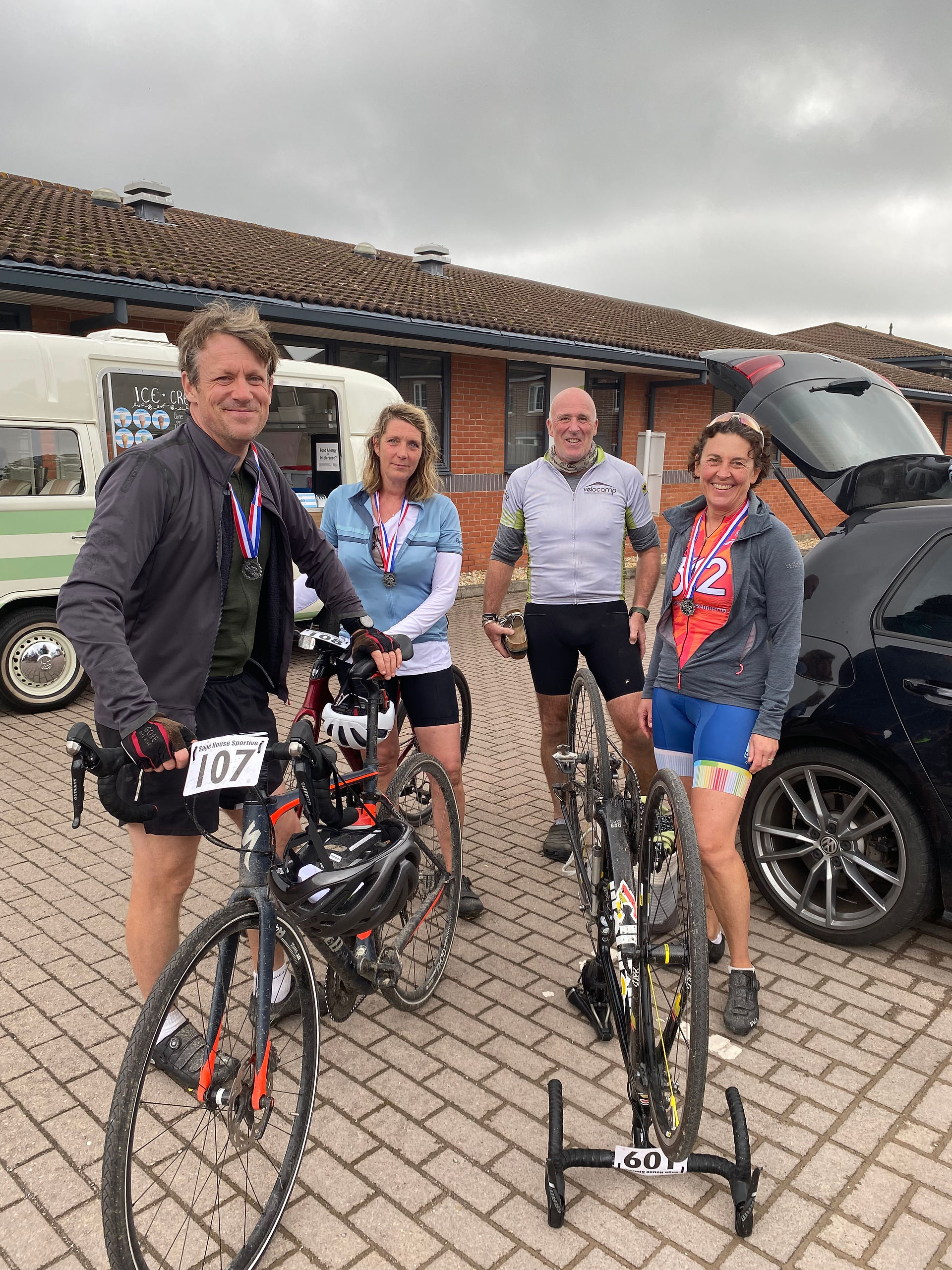 Two cyclists on their bikes ready to start at Sage House Sportive