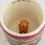 Thumbnail: Peek-A-Boo Coffee Mug - Border Print Dog