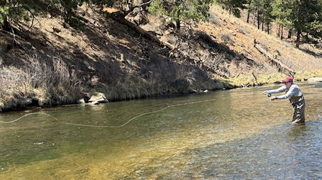 Sean learning to fly fish on the South Platte River during his first outing.