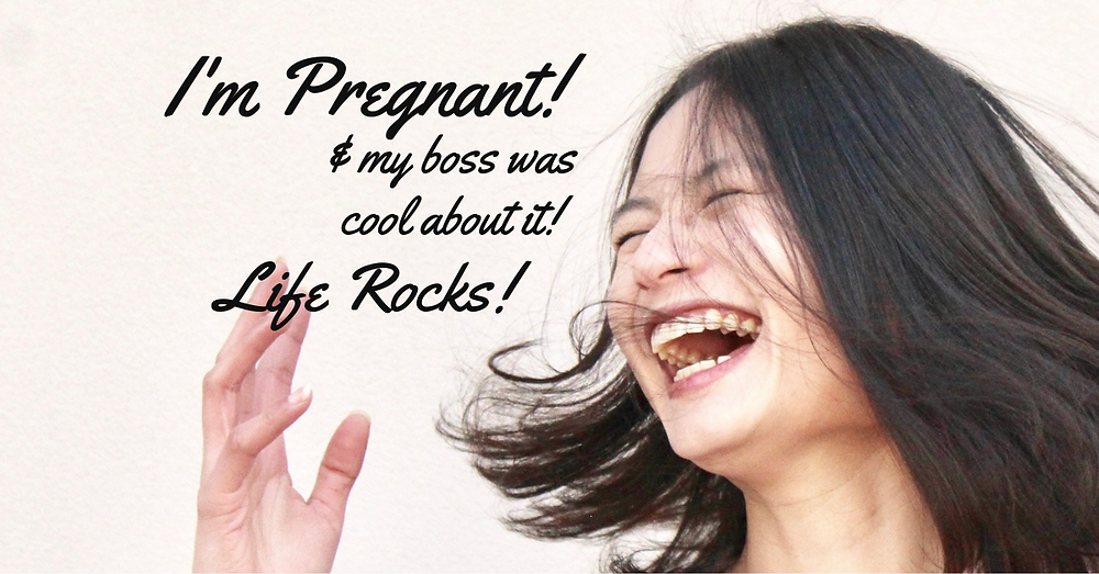 A woman is happy about her pregnancy.