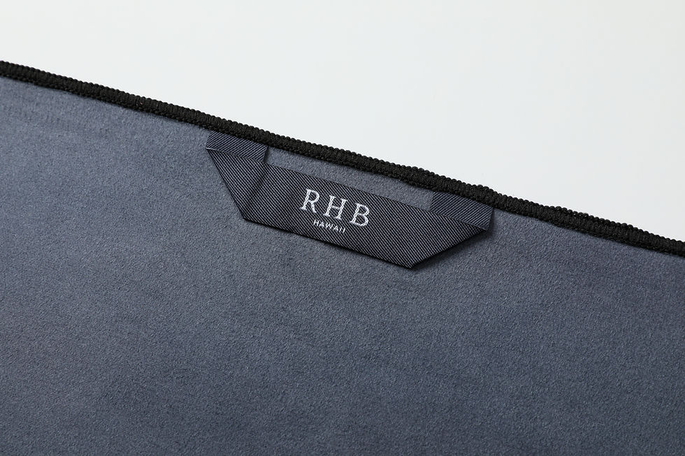 Thumbnail: Flower Night beach towel showing the hanging loop and RHB Hawaii logo tag.