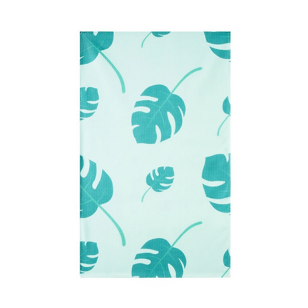 Kaneohe kitchen tea towel in waffle weave microfiber with aqua tropical leaf print.