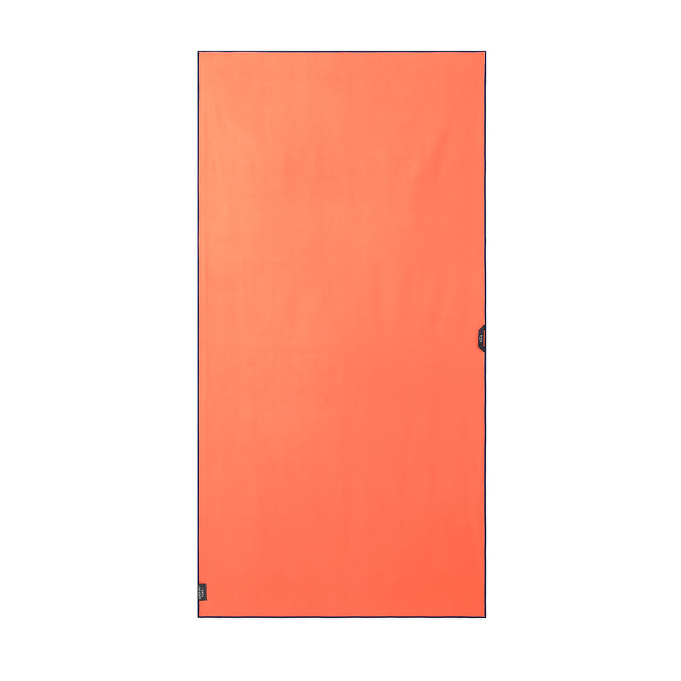 Rainbow Garden beach towel back side in solid orange.